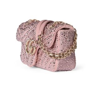 Alternative view of The iconic GG Marmont collection masterfully blends the classic double G motif with light gold-tone faceted chain straps, crafting a timeless handbag design.Crafted in light pink nubuck leather and adorned with crystal embellishments, this shoulder bag exudes refined elegance. Light pink nubuck leather with crystal quilting Light gold-tone hardware Pink viscose lining Double G interior: 1 open pocket Slide chain strap doubles as shoulder strap (55cm height) Spring-loaded snap closure Model: 837280.Dimensions: 22 cm (W) x 12.5 cm (H) x 6 cm (D) Weight: Approx. 0.55 kg Color: Light Pink/Crystal Made in Italy