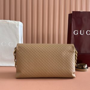 Alternative view of p1050💋💋💋【Original Retail Packaging】This handbag blends contemporary silhouettes with the brand's iconic motif. Featuring fluid lines and a chain in antique gold with interlocking double G details, it offers ample interior storage with a two-compartment design.Brown GG embossed suede with antique gold hardware. Brown cotton-linen blend lining. Interior: 2 compartments, 1 open pocket. Chain shoulder strap height: 8 cm. Detachable, adjustable leather shoulder strap (height: 42 cm). Magnetic snap closure. Model: 857362.Dimensions: 36 cm (W) x 19.5 cm (H) x 9.5 cm (D) Weight: Approx. 1.1 kg Color: Apricot/Embossed