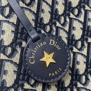 Alternative view of In Stock‼️ Dior's New Star Bucket Bag Collection The latest stunning handbags have arrived! Crafted from classic Oblique monogram fabric with exquisite workmanship, this adorable bucket bag design blends elegance with modern style. Its soft silhouette features a drawstring closure and removable long shoulder strap, combining practicality with beauty. Perfect for holiday outings—carry it with flair wherever you go!