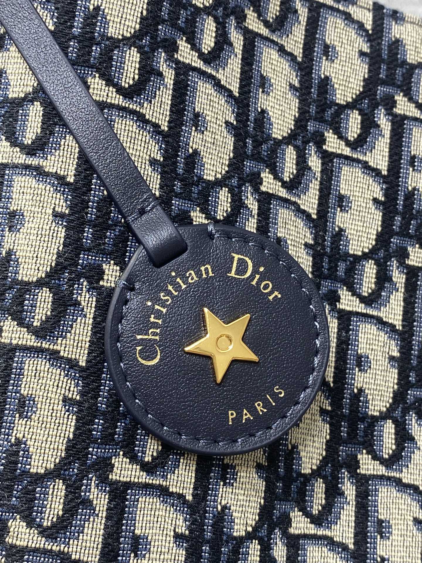 In Stock‼️ Dior's New Star Bucket Bag Collection The latest stunning handbags have arrived! Crafted from classic Oblique monogram fabric with exquisite workmanship, this adorable bucket bag design blends elegance with modern style. Its soft silhouette features a drawstring closure and removable long shoulder strap, combining practicality with beauty. Perfect for holiday outings—carry it with flair wherever you go! - Image 2