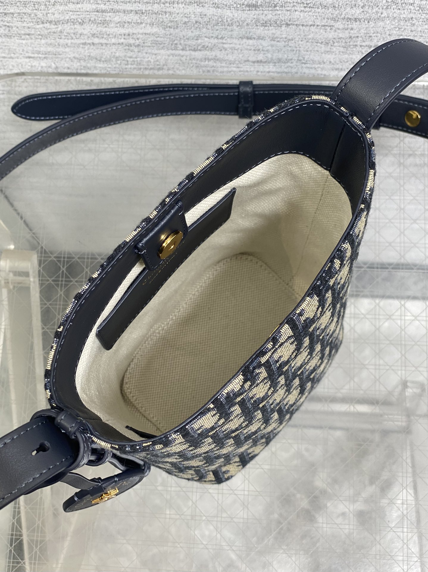 In Stock‼️ Dior's New Star Bucket Bag Collection The latest stunning handbags have arrived! Crafted from classic Oblique monogram fabric with exquisite workmanship, this adorable bucket bag design blends elegance with modern style. Its soft silhouette features a drawstring closure and removable long shoulder strap, combining practicality with beauty. Perfect for holiday outings—carry it with flair wherever you go! - Image 7