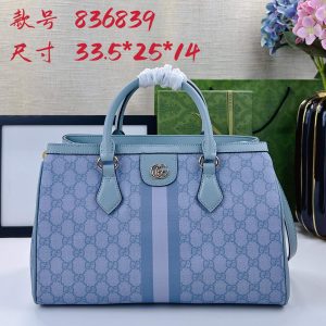 Batch 340... The new Ophidia collection presents striking silhouettes and functionality, expertly crafted in signature beige and brown colorways to create soft, refreshed bag designs.Beige and dark brown GG canvas Brown leather trim Light gold-tone hardware Green cotton lining Interior: One open pocket, one zippered pocket in the center compartment Handles (10 cm high) Removable and adjustable leather shoulder strap (Height: 50 cm to 55 cm;Length: 108 cm to 118 cm) Model: 836839 Dimensions: 33.5 cm (W) x 25 cm (H) x 14 cm (D) Weight: Approx. 0.95 kg Color: Sky Blue PVC Blue Leather. Made in Italy