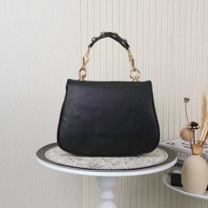 Alternative view of Batch 400... Style No.: 721172 Black leather Dimensions: 29x22x7cm Blondie Series Tote Bag. This shoulder bag features studded handles, beige and ebony GG canvas, gold-tone hardware, and a circular double G interlocking clasp with two interchangeable shoulder straps.