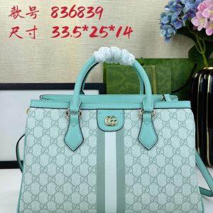 Batch 340... The new Ophidia collection presents striking silhouettes and functionality, expertly crafted in signature beige and brown colorways to create soft, refreshed bag designs.Beige and dark brown GG canvas Brown leather trim Light gold-tone hardware Green cotton lining Interior: One open pocket, one zippered pocket in the center compartment Handles (10 cm high) Removable and adjustable leather shoulder strap (Height: 50 cm to 55 cm;Length: 108 cm to 118 cm) Model: 836839 Dimensions: 33.5 cm (W) x 25 cm (H) x 14 cm (D) Weight: Approx. 0.95 kg Color: Green leather. Made in Italy