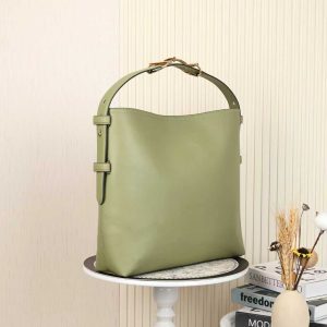 Alternative view of Batch 340...2025 Fall/Winter Collection. The Gucci Beatrix handbag is expertly crafted from black calf leather, featuring a shoulder strap adorned with the iconic horsebit detail that infuses casual silhouettes with the brand's essence. Gold-tone hardware adds refined sophistication, while an interior zippered pocket ensures daily essentials stay secure. Combining elegant design with practical functionality, it effortlessly accommodates everyday necessities.Black supple smooth calf leather Gold-tone hardware Black cotton-linen blend lining Shoulder strap with horsebit detail Interior: Zippered pocket Adjustable shoulder strap height: 26 cm - 33 cm; Length: 94 cm Model: 850546 Dimensions: 40 cm (W) x 36 cm (H) x 12 cm (D) Weight: Approx. 1 kg Color: Green Full LeatherDesigned in Italy