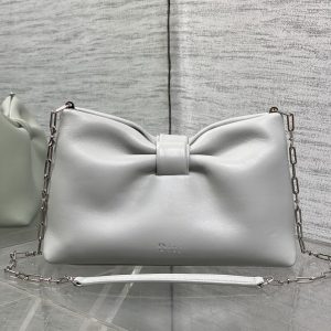 In Stock‼️🎀Dior-LAMBSKIN 2026 Spring/Summer New Arrival LAMBSKIN Chain Bag. A fresh silhouette crafted from supple calfskin leather, exuding elegant sophistication. This versatile design effortlessly accommodates daily essentials, making it the perfect companion for both daytime and evening wear.Features a detachable chain strap adorned with a bow🎀 for added charm. Can be carried by hand or worn crossbody. 0713 Size: 26*16*10cm