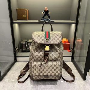 Batch 380...G G Ophidia Collection masterfully blends beige and dark brown hues, pairing classic silhouettes with innovative functionality in exceptionally soft-touch fabrics. This backpack features GG monogrammed coated fabric, meticulously embellished with double G logos and woven strap details.Beige and dark brown GG interlocking pattern coated fabric Dark brown leather trim Gold-tone hardware Dark green linen-cotton blend lining Model: 839109 Dimensions: 28 x 40 x 12 cm