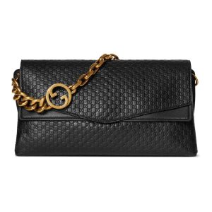 Large 💕 This handbag blends contemporary silhouettes with the brand's iconic motif. Featuring fluid lines and a chain in antique gold with interlocking double G details, it offers ample interior storage with a two-compartment design.Black GG embossed grained lambskin Antique gold-tone hardware Black cotton-linen blend lining Interior: 2 compartments, 1 open pocket Chain shoulder strap height: 8 cm Removable, adjustable lambskin shoulder strap (height: 42 cm) Magnetic snap closure Model: 857362.Dimensions: 36 cm (W) x 19.5 cm (H) x 9.5 cm (D) Weight: Approx. 1.1 kg Color: Black/Embossed