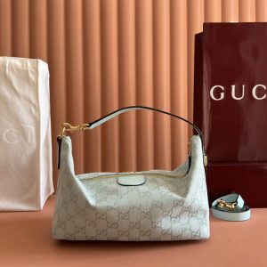 Alternative view of p630🔥【Complete Counter Packaging】Drawing inspiration from classic makeup cases, the Gucci Vanity series features a striking silhouette with three versatile carrying options. This handbag can be worn over the shoulder or folded into a top-handle tote.With the additional strap, it transforms into a crossbody bag. Beige and brown GG canvas Brown leather trim Gold-tone hardware Green linen-cotton blend lining Double G Sliding handle: 4 cm - 42 cm Removable, adjustable leather shoulder strap Zipper closure Model: 857799.Dimensions: 27.5 cm (W) x 13 cm (H) x 14.5 cm (D) Weight: Approx. 0.45 kg Color: Blue