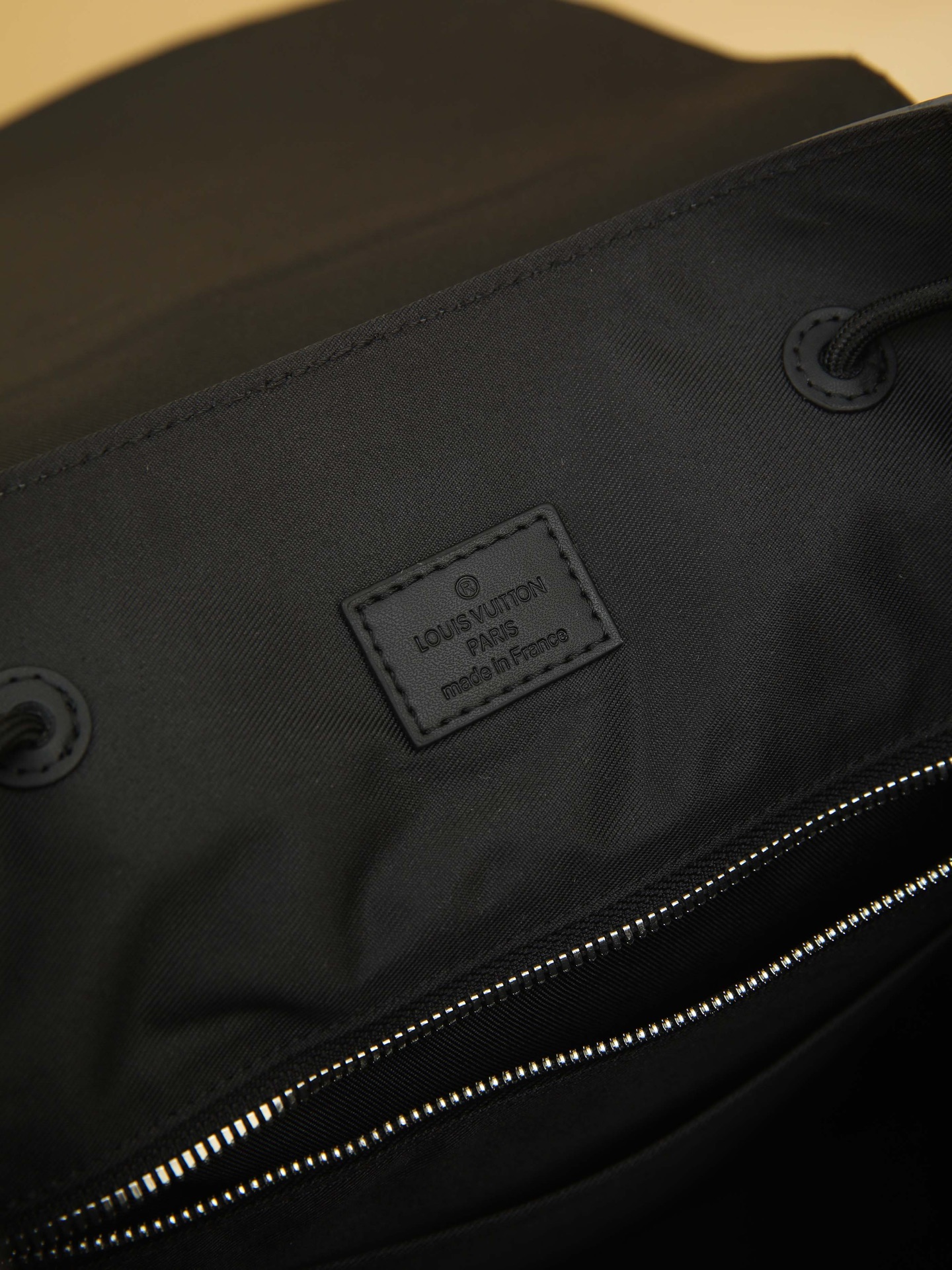 The compact backpack reinterprets the rugged, unpretentious spirit of a hiking pack in Monogram canvas. Its distinctive design seamlessly transitions between work and leisure, embodying a premium lifestyle. 41 x 47 x 13 cm (L x H x W) - Image 9