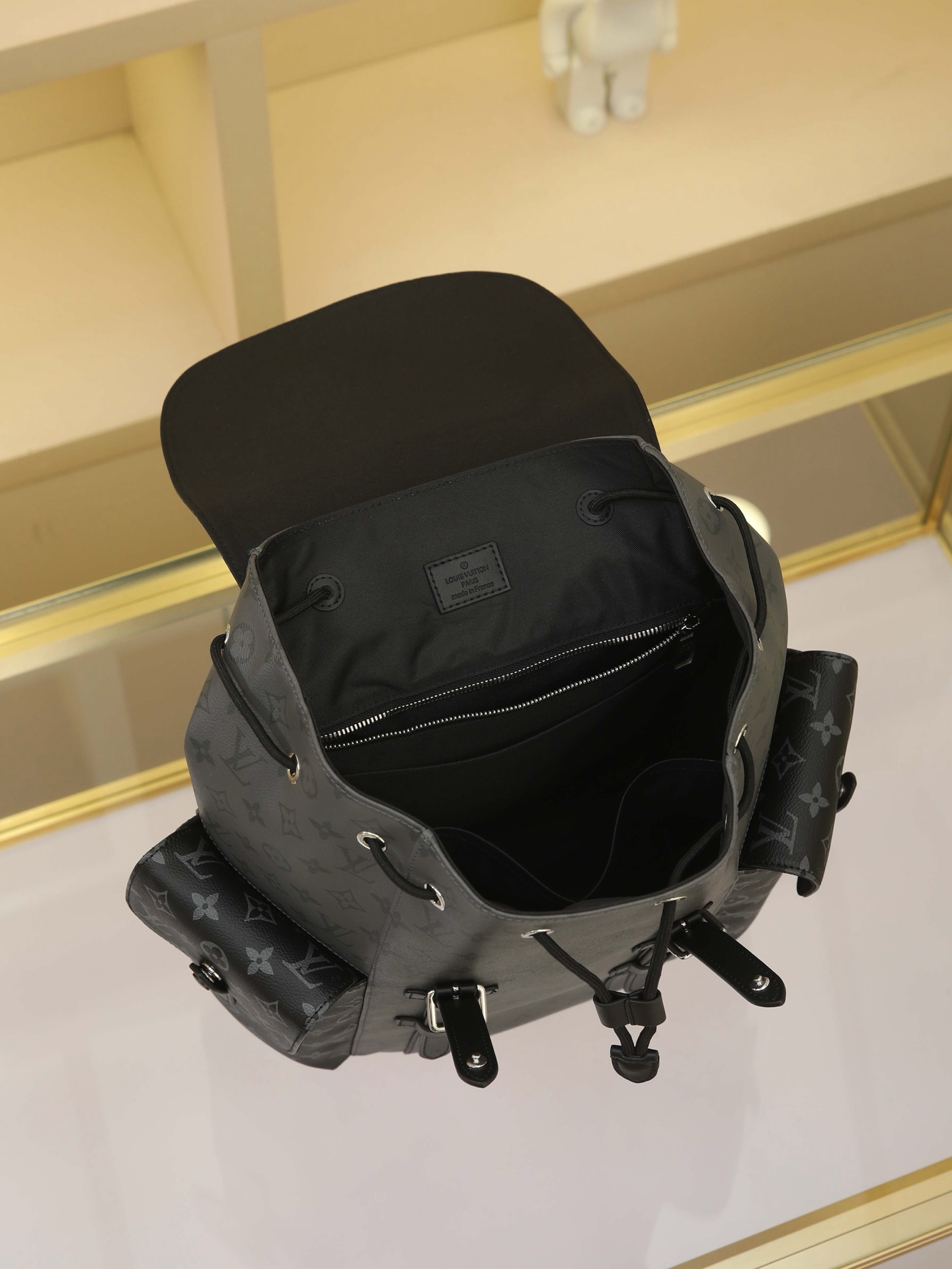 The compact backpack reinterprets the rugged, unpretentious spirit of a hiking pack in Monogram canvas. Its distinctive design seamlessly transitions between work and leisure, embodying a premium lifestyle. 41 x 47 x 13 cm (L x H x W) - Image 8