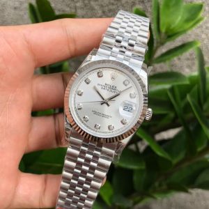 Alternative view of 【High Quality】Latest Version: Crown logo at 6 o'clock on dial Rolex 36mm Datejust Movement Type: Automatic Mechanical Gender: Unisex Movement Type: ETA Automatic Mechanical Power Reserve: 42 hours Case Diameter: 36mm Case Thickness: N/A Dial Color: Silver Dial Shape: Round Strap Color: Silver Clasp Type: Oysterlock folding clasp with 5mm Easylink extension system Case Back: Screw-down case backWeight: N/A Water Resistance: 100 meters Case Material: 904L steel Bezel: Tri-bezel with fluted finish Dial: High-readability Chromalight display with long-lasting blue luminescent material Crystal: Scratch-resistant sapphire crystal with magnifying lens over date window Crown: Screw-down crown with double waterproof system Bracelet: Oystersteel, Jubilee, three-link and five-link bracelet Exceptional value for money!36mm dial size suits smaller wrists—perfect for both men and women!