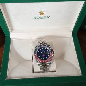 N+ Rolex GMT, featuring the official latest "Coke Bezel" modification—exposed to ultraviolet light, the bezel displays "full red" luminescence‼️ Available with either the 3186 or 3285 movement for your selection!