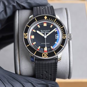 Blancpain Fifty Fathoms [Barracuda] Replica Watch 1⃣️ Hailed by watch enthusiasts as the pinnacle of aesthetics among Blancpain timepieces!The dial features a black base with layered aged red and beige hour markers. The domed sapphire crystal and rotating bezel shimmer like jade in sunlight.         2⃣️ The strap faithfully replicates the fabric-textured rubber band with a stainless steel pin buckle.Eschewing current trends for oversized cases, the Barracuda maintains a 40.3mm diameter with 300m water resistance. Powered by the 9015-modified Calibre 330S movement, it delivers precise timekeeping. Every detail replicates the original 1:1 replica.3⃣️ Its size closely matches Rolex's Submariner series, making this diameter more suitable for most wearers. Notably, this watch boasts exceptionally strong luminescence with a beautiful green glow. Watch enthusiasts often hail it as the most beautiful Barracuda. Feel free to share. Tw production—guaranteed premium quality!