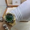 Royal Authentic  Rolex GMT-Master II in Solid Gold with Green Dial