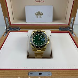 Alternative view of Royal Authentic  Rolex GMT-Master II in Solid Gold with Green Dial