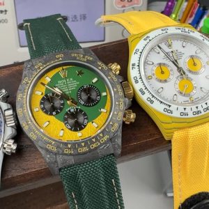 TW Factory ROLEX Cosmograph Daytona Carbon Fiber Custom Edition. This timepiece offers lightweight comfort while maintaining a robust exterior. Each watch features a uniquely patterned carbon fiber material. 【Case】 Dimensions of 40x12.4mm perfectly match the original. TW Factory masterfully crafts the distinctive character of carbon fiber Rolex watches.Exclusively in the market, the entire case, bezel, and caseback are crafted from high-composite carbon fiber and ultra-bright luminous powder. Details undergo hand-finished chamfering and polishing for exceptional texture. 【Bracelet Clasp】The strap features a hand-woven synthetic fiber band, offering breathable comfort and soft texture. 【Movement】Equipped with the latest precise and mature Shanghai 4130 movement, it perfectly delivers powerful functionality—the ultimate value for money!!!