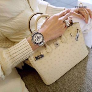 Who says women can't wear a Rolex "Panda" Daytona? Check out the pictures.