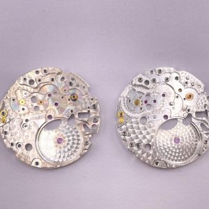 Left: (Authentic) --- Right: (Shanghai 4131) Molded Replica Detailed Comparison of Genuine vs. Replica Images for Rolex's In-House 4131 Multi-Function Chronograph Movement. C Factory's New Daytona 4131 Movement, Daytona Movement Diagram.The 4131 movement is manufactured by Shanghai 4130, featuring 75-hour power reserve. Movement finishing/plating/engraving/assembly are independently completed by Factory C. Therefore, strictly speaking, the Shanghai 4131 movement is a collaborative effort between Shanghai and Clean.Numerous issues present in the previous Shanghai 4130 movement—such as stability concerns, chronograph reset failure, rough finishing, incorrect dimensions, winding feel, and rotor noise—are all perfectly resolved in the 4131.Additionally, Clean has secured exclusive production rights for the Shanghai 4131 movement. Visual comparisons reveal that disassembled genuine 4131 and SH 4131 movements share identical appearance and dimensions, though minor differences exist in specific shock absorber stones.It's crucial to emphasize that the previous Shanghai 4130 movement and this new 4131 belong to entirely different tiers of quality in every detail. A limited number of pre-release samples have already been distributed, receiving excellent feedback from customers. Of course, this 4131 still requires market validation—we ask for your patience, and we promise it will deliver a pleasant surprise. The engraving shown in the images is a preliminary version; the mass-produced version will be much closer to the final design. Overall, the level of authenticity is exceptionally high.