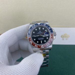 Alternative view of Royal Authenticity: Rolex GMT-Master III with Triplock Bracelet and Coca-Cola Bezel