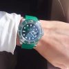 Green Submariner with green rubber strap