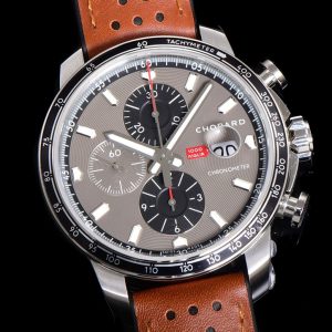 Alternative view of 🇧🇪 V7's Ultimate Chopard Masterpiece Proudly Presented by Seven Stars Chopard Racing Series Premium Collection The Ultimate Masterpiece Exceptional Aesthetics Top-Tier Craftsmanship 1. V7 Factory is the industry's sole entity to acquire the Chopard Classic Racing Series limited edition watch for mold creation. This timepiece presents exceptionally high difficulty across all details.V7 spent over a year and dozens of revisions to achieve a perfect clone. As shown in the simple disassembly, every aspect perfectly matches the original, presenting authentic character. 2. This Racing Series chronograph features rich dial and caseback details. As illustrated, V7's dial perfectly replicates the original's color and texture, with printing indistinguishable from the genuine article.Notably, the watch is fitted with an exceptionally large, ultra-transparent sapphire crystal boasting industry-leading clarity, perfectly matching the genuine piece. Crucially, the sapphire features an integrated date magnifier identical to the authentic model (unlike Rolex's surface-mounted magnifier). This highly cost-intensive technique is unique in the industry, delivering truly commendable results!3. V7 Factory maintains rigorous standards, focusing on both form and function. Though the movement remains hidden beneath the solid caseback, they eschew the common practice of using unfinished 7750 movements. Instead, they custom-engineered an optimized, precision-finished 7750 movement that mirrors the genuine article. Both performance and aesthetics achieve near-perfect alignment with the original, and internal components are fully interchangeable with authentic parts.The crown and crown tube's shape and dimensions are professionally customized to match the genuine article. 4. V7 Factory upholds its signature masterful case craftsmanship. The case diameter, thickness, lines, and curves are 100% identical to the original. The checkered pattern filling on the caseback is cloned using identical materials and techniques as the genuine piece, with crisp, bold engravings that are utterly convincing!5. V7 Factory leaves no detail overlooked: the fishscale pattern and engravings inside the case back, screw positions, engraving depth, bezel, and sapphire components all achieve perfection, enabling seamless replacement with genuine parts.6. V7 Factory's industry-exclusive design features a genuine imported natural rubber strap with perforated ultra-thin calfskin lining, synchronized with the original exterior. The inner side of the rubber strap is adorned with a 1960s-style Dunlop tire tread pattern.Visually and tactilely indistinguishable from the genuine article, the newly molded folding clasp faithfully replicates the original's structure, material, and polish—a flawless clone! V7 Factory's strap and clasp craftsmanship and materials represent the industry's pinnacle, with costs reaching several times the standard industry norm.7. The hands are meticulously crafted, with length, angle, width, pinholes, and color all matching the genuine article. Finishing is exceptionally precise! 8. The dial's color, texture, and pattern, along with the calendar font, perfectly replicate the authentic aesthetic. The highly challenging inner shadow hour markers are also precisely matched.9. V7 Factory's luminescence synchronizes with the original, utilizing premium Swiss-imported luminous material for exceptionally strong night visibility. The V7's even luminescent filling even surpasses the genuine article in effect!10. The Chopard Racing watch faithfully preserves the series' classic style—robust, clear, elegant, and practical. Designed as a sporty timepiece for racing enthusiasts, it remains exceptionally stylish even when paired with formal attire. With a 44mm diameter and 14mm thickness, it offers extreme comfort on the wrist. This V7 masterpiece delivers pure, authentic quality—truly a must-have!