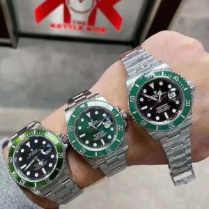 Three generations of the Green Submariner—which one do you prefer? The strap can be swapped for a rubber strap.