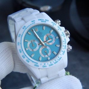 Alternative view of CS Factory Rolex CS Factory dedicates its expertise to crafting the Rolex Picasso Ceramic Collection.Transformed from Rolex by Germany's AET REMOULD, CS spent 1 year and 8 months meticulously researching and comparing every detail to create the most "exquisite" and "elegant" masterpiece. Key Features: 1. CS employs specialized diamond cutting tools and advanced six-axis CNC machining. These unique tools and techniques overcome ceramic's inherent brittleness, achieving flawless perfection without a single imperfection.Hand-polishing was applied to intricate details, achieving exquisite refinement and a lustrous finish! 2. The engraved "units per hour" text and numerals on the bezel harmonize with the dial's color scheme. The white markings on the bezel feature uniform spacing, executed with high-end enamel filling for crisp, precise lettering—not a single burr in sight!3. The sapphire crystal glass is pure and uncoated, offering crystal-clear transparency. This sapphire glass provides superior scratch resistance, and a high-quality crystal significantly elevates the overall feel of the watch! 4. Dial Features: The ceramic Daytona retains the original Daytona's characteristics with minor adjustments. The small seconds dial has been slightly modified, with hydraulic pressure creating a raised outer ring for enhanced dimensionality!5. The most distinctive dial feature: The 12 o'clock crown logo is molded from the original design, achieving a 1:1 match with the genuine article! Most replicas have a rounder logo with visible burrs and an elongated shape. CS Factory pursues perfection—the crown at 5 o'clock is smoothly rounded with a three-dimensional effect, featuring a slightly flattened circle and zero burrs! 6. CS uses the 7750 single-lever movement, making time adjustment easier for the wearer!The tubular hour/minute wheels ensure hands lie perfectly flush against the dial, vividly recreating the racing aesthetic! 7. The ceramic case achieves an overall thickness of just 12.4mm at its thinnest point, matching the official model! CS Factory meticulously studies every detail, demanding the utmost "excellence" and "elegance" in every aspect! This delivers a 100% authentic wearing experience for customers.