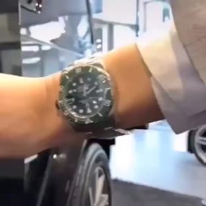 You can tell how cool the lady looks wearing that green Submariner.