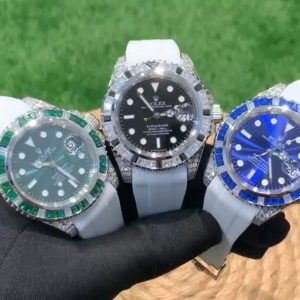 New Arrival 💍 Rolex 💍 Gemstone Bezel Custom-Grade Submariner Revamp [Color] Collaborating with premium jewelry workshops, we've lavishly set 72 black, green, and blue sapphires to match the Submariner bezel. Paired with diamonds adorning the lugs, it radiates dazzling brilliance—a true eye-catching masterpiece. 【Movement】Features the 💯 brand-new ETA automatic mechanical movement, delivering precise timekeeping, outstanding performance, and a 48-hour power reserve. 【Case】316L stainless steel case set with black, green, and blue sapphires matching the Submariner's bezel. Swarovski crystals adorn the lugs, crown, and crown guard, exuding ultimate luxury and bold individuality.Classic designs never clash. [Color] Scratch-resistant sapphire crystal glass, blue light magnifier calendar window, and exquisite craftsmanship perfectly preserve the original diving performance. 【Dial】Clear hour markers, ultra-strong and long-lasting ice-blue luminescence, with details matching the genuine article. 【Strap】This modification offers three distinct strap options: matching custom silicone, genuine leather, and original steel bracelet. Each provides a different texture and feel, allowing versatile styling to suit your needs. ⚠️ Ensure you recognize the exclusive quality.