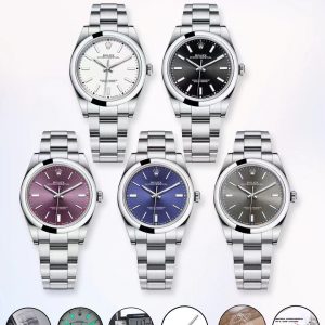 N+AR Redefines Excellence, Setting the Benchmark for Swiss Replicas! Rolex Oyster Perpetual Series 114300 39mm 【Eight Major Upgrades】🎮XF3 1. Sapphire crystal features a 125-point anti-counterfeiting mark at 6 o'clock, precisely replicated at the crystal's mid-layer position—matching the genuine watch's placement! Discernible only upon close inspection.2. The case and bezel feature a precision-ground finish using 904L steel, with uniform internal engraving codes and perfectly aligned component assembly! 3. Dial diameter measures 39mm, with thickness matching the genuine model at 11.7mm. 4.NR Factory's steel bracelet meticulously replicates every detail, including the official model code 114300 engraved at the 12 o'clock position inside the bracelet link joint. 5. The brushed steel bracelet used by N+AR Factory is currently the most precise on the market. Combined with the exquisite flathead screws and the brushed finish of 904L stainless steel, the wearing experience is indistinguishable from the genuine article!  6. The meticulously polished clasp structure replicates the original's internal mechanism, achieving a flawless folding action. The interior shows no imperfections whatsoever! 7. The caseback's gearing faithfully reproduces the original's tooth pattern. Seiko's precision brushing technique outshines all other versions on the market! 8. The dial features exquisite polishing and Swiss-imported luminous powder densely applied for an ultra-vibrant ice-blue night glow—identical to the original! 🎮 After examining the 124300, revisit this 114300—Rolex's inaugural color dial series. It also features the most standard Asian-sized 39mm case. When Rolex first updated to 39mm, it sold out immediately, especially the gray model with later white and black full-luminous dial markers! Its outstanding yet understated color scheme is particularly favored by successful business professionals!This Oyster Perpetual, meticulously crafted by N+AR to match the original's quality, showcases attention to detail visible to the naked eye. To align the crown's positioning with the authentic model, it features the original Seagull 2836-2 gold-plated movement. Watch enthusiasts know the ETA 2836-2 movement is renowned for its stability—with daily accuracy within 0.3 seconds—and exceptional value!Additionally, the manufacturer has meticulously replicated the 114300 model's lug-to-bracelet transition!Attention to detail extends to both visible and hidden elements! The Oyster Perpetual-exclusive brushed steel bracelet features an internally stamped logo shape, making it the market's only authentic Oyster bracelet [slim profile]. The clasp's internal code retains the AR original bracelet's 7UM marking, with all colors perfectly matching the original color chart! Oyster Swiss Super Ice Blue Luminous!If you're truly unsure which to choose, we strongly recommend this flawless 114300! Look for the NR quality seal: one watch, one certificate, one Rolex-branded velvet pouch. [NR: Born for Value] 🎮 Sanjie Exquisite recommends this men's mechanical watch. SJ meticulously crafts ultra-realistic product photography.