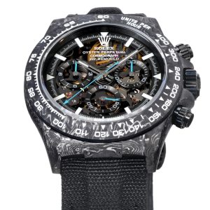 Alternative view of TW Factory ROLEX Cosmograph Daytona Carbon Fiber Custom Edition. This timepiece offers lightweight comfort while maintaining a robust exterior. Each watch features a uniquely patterned carbon fiber material. 【Case】 Dimensions of 40x12.4mm perfectly match the original. TW Factory masterfully crafts the distinctive character of carbon fiber Rolex watches.Exclusively in the market, the entire case, bezel, and caseback are crafted from high-composite carbon fiber and ultra-bright luminous powder. Details undergo hand-polished chamfering for exceptional texture. 【Bracelet Clasp】The strap features a hand-woven synthetic fiber band, offering breathable comfort and soft texture. 【Movement】Equipped with the latest precise and mature 4802 movement, it perfectly delivers powerful functionality—the ultimate value for money!!!
